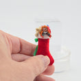 Load image into Gallery viewer, the stocking held inside a hand