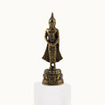 Load image into Gallery viewer, Bronze Buddha statue on a white pedestal with a white background