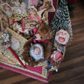 Load image into Gallery viewer, Decorative item with teddy bear, vintage-style face, and small tree on a wooden surface