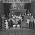 Load image into Gallery viewer, Black and white miniature room setup with furniture and decorative items.