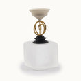 Load image into Gallery viewer, Decorative miniature object with a white compote bowl top base, a gold circular design, and a black carved round base on a white background