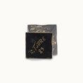 Load image into Gallery viewer, Black decorative box with gold text on a white background, the signature of Artist Rosemarie Torre, dated 1983.