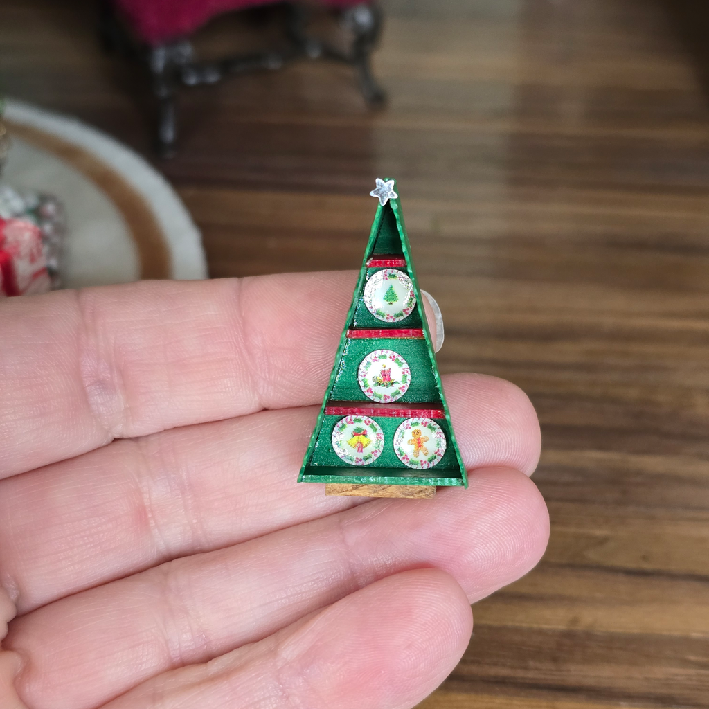 Signed Dollhouse Miniature Christmas Tree-Shaped Plate Display Box held in a hand
