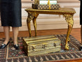 Load image into Gallery viewer, Louis Vuitton Brass Miniature Display Suitcase Trunk 1980s, on floor
