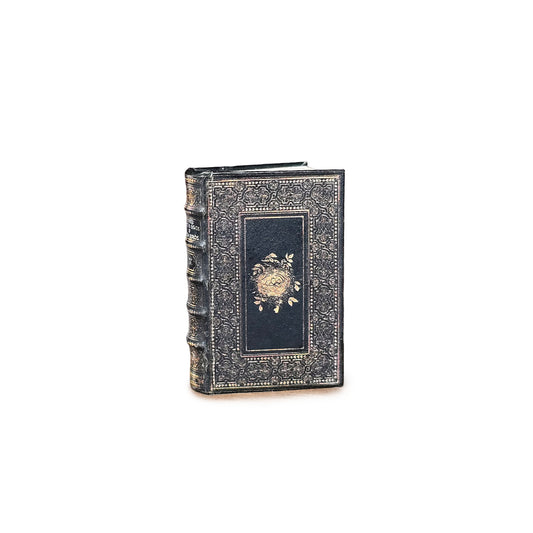 Decorative book with intricate design on a white background