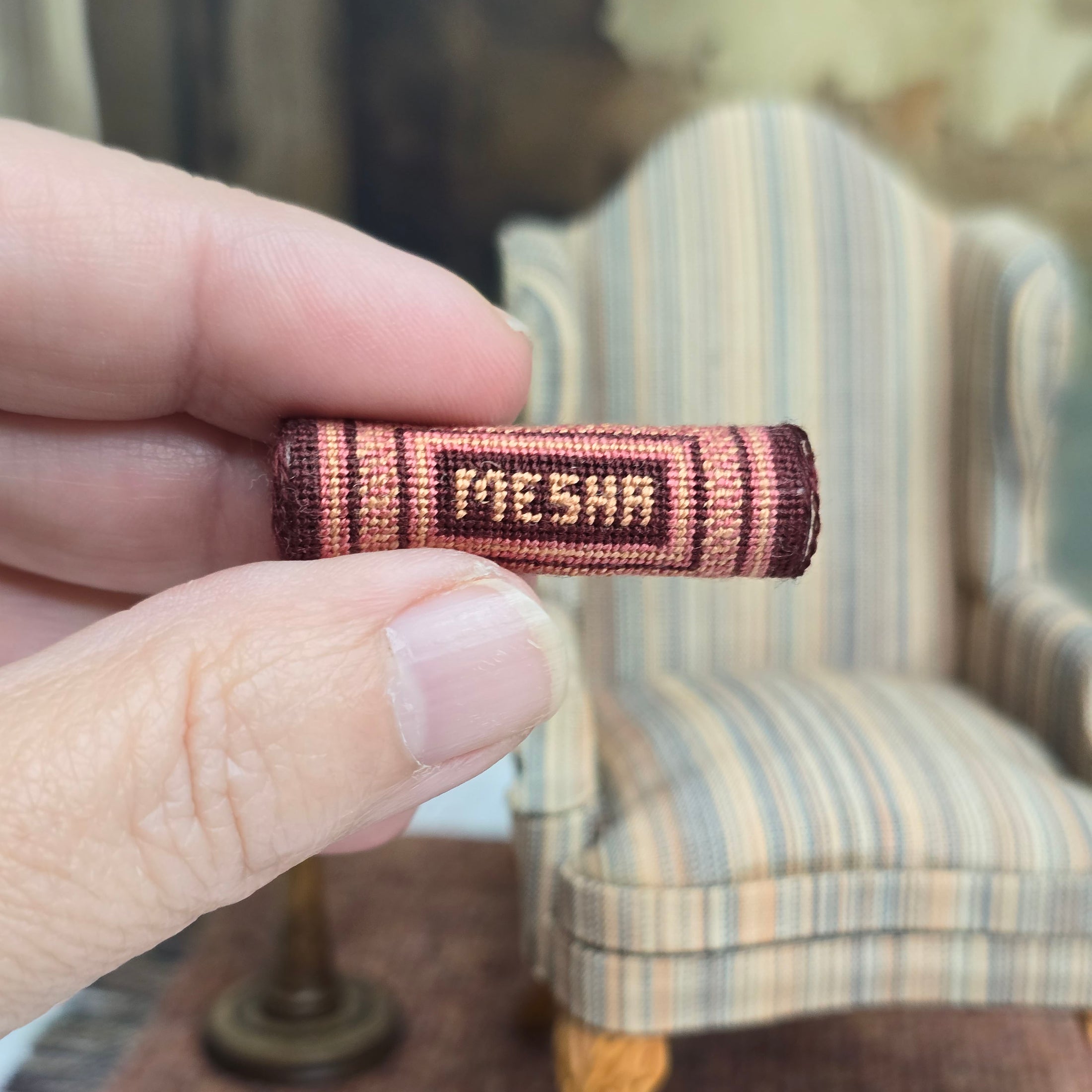 Miniature Hand-Stitched Petit-Point “Mesha” Bolster Pillow by Sharon Garmize (1:12 Scale)