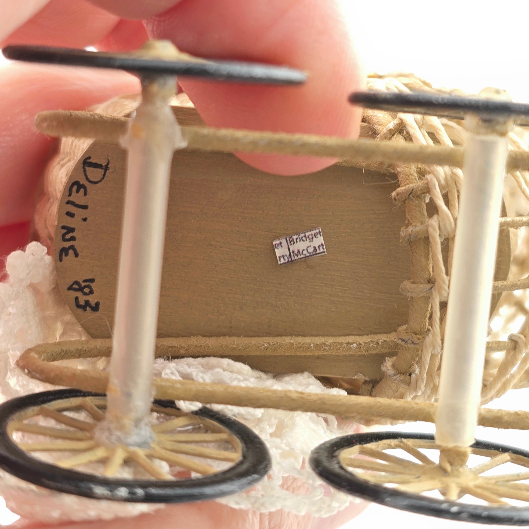 Signed Wicker Baby Pram with Porcelain Infant Doll and Cat by Bridget McCarty