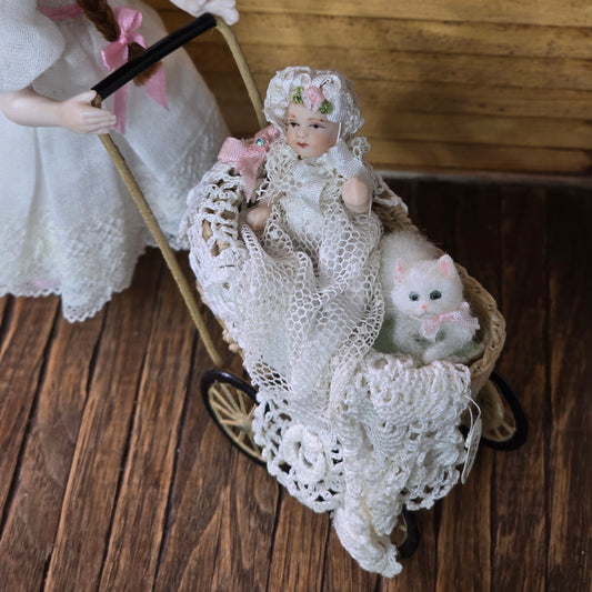 Signed Wicker Baby Pram with Porcelain Infant Doll and Cat by Bridget McCarty