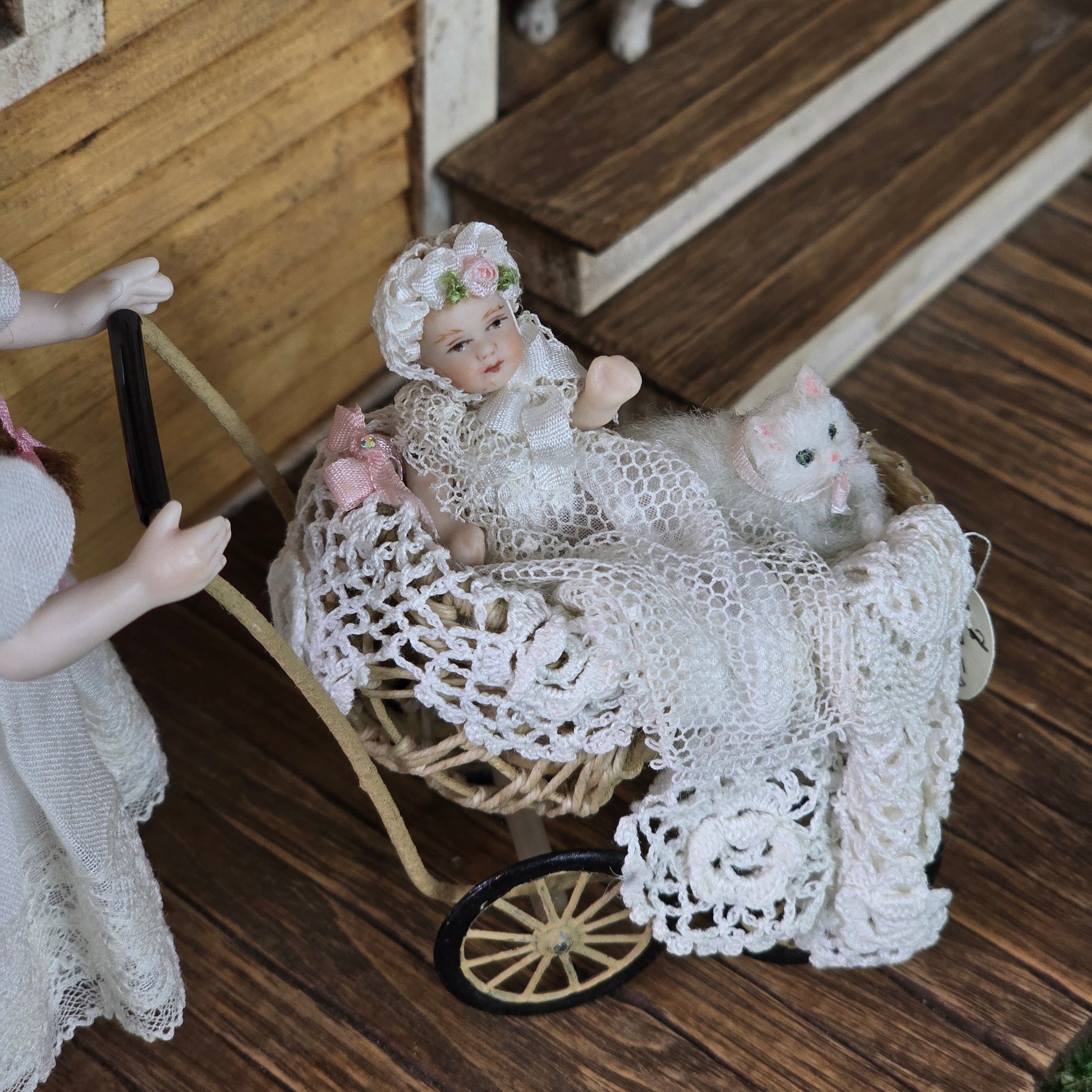 Signed Wicker Baby Pram with Porcelain Infant Doll and Cat by Bridget McCarty