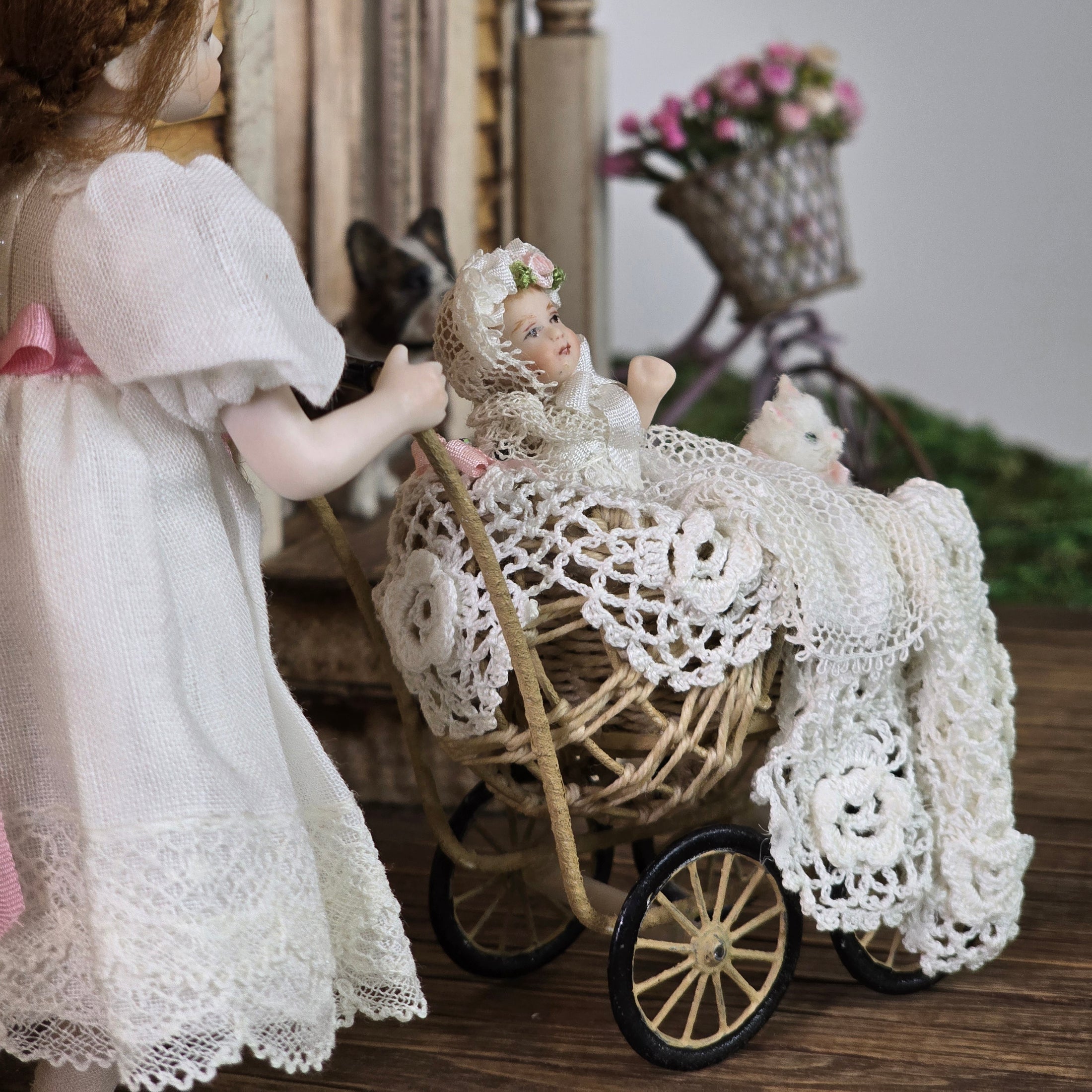 Signed Wicker Baby Pram with Porcelain Infant Doll and Cat by Bridget McCarty