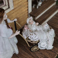 Load image into Gallery viewer, Signed Wicker Baby Pram with Porcelain Infant Doll and Cat by Bridget McCarty
