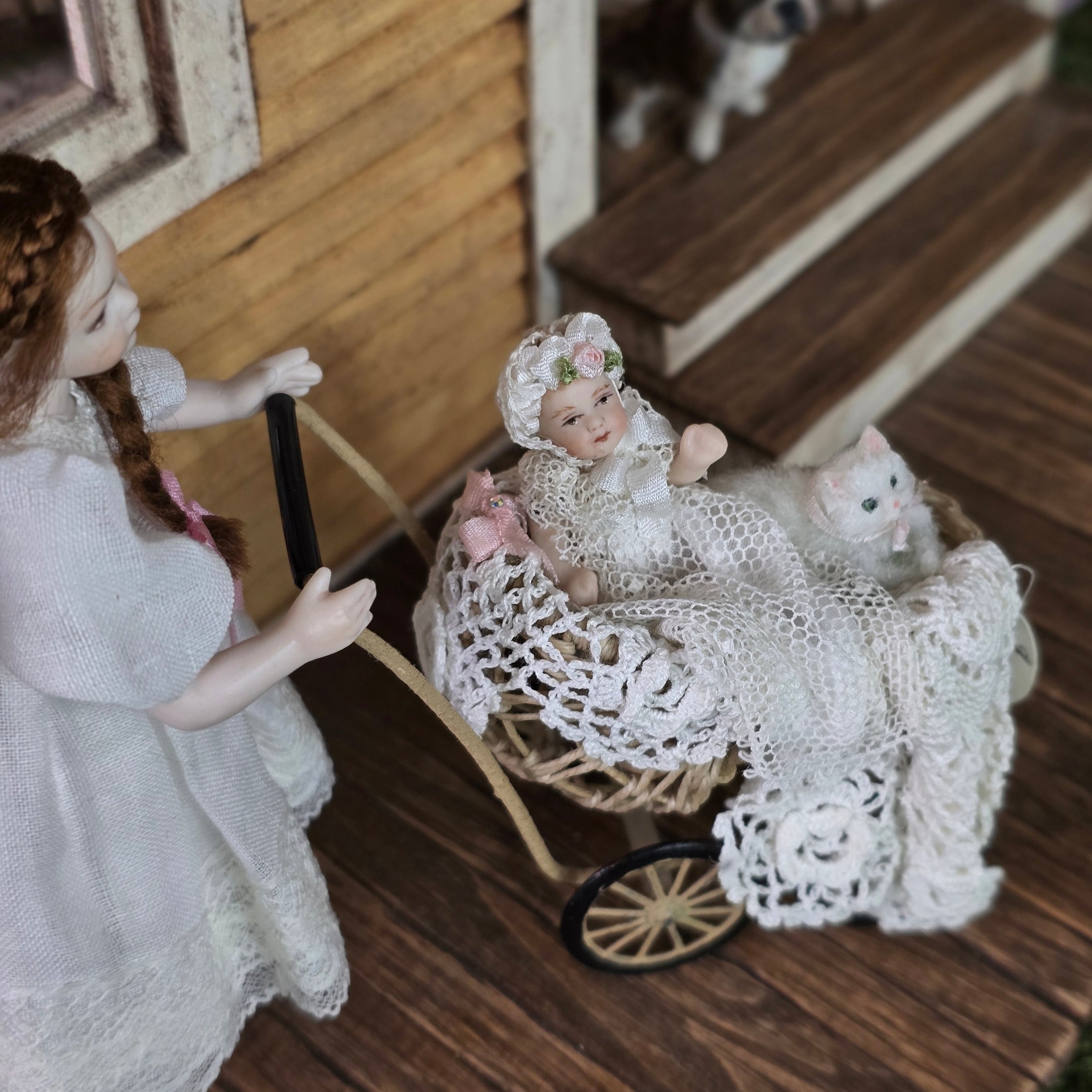 Signed Wicker Baby Pram with Porcelain Infant Doll and Cat by Bridget McCarty