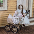 Load image into Gallery viewer, Signed Wicker Baby Pram with Porcelain Infant Doll and Cat by Bridget McCarty
