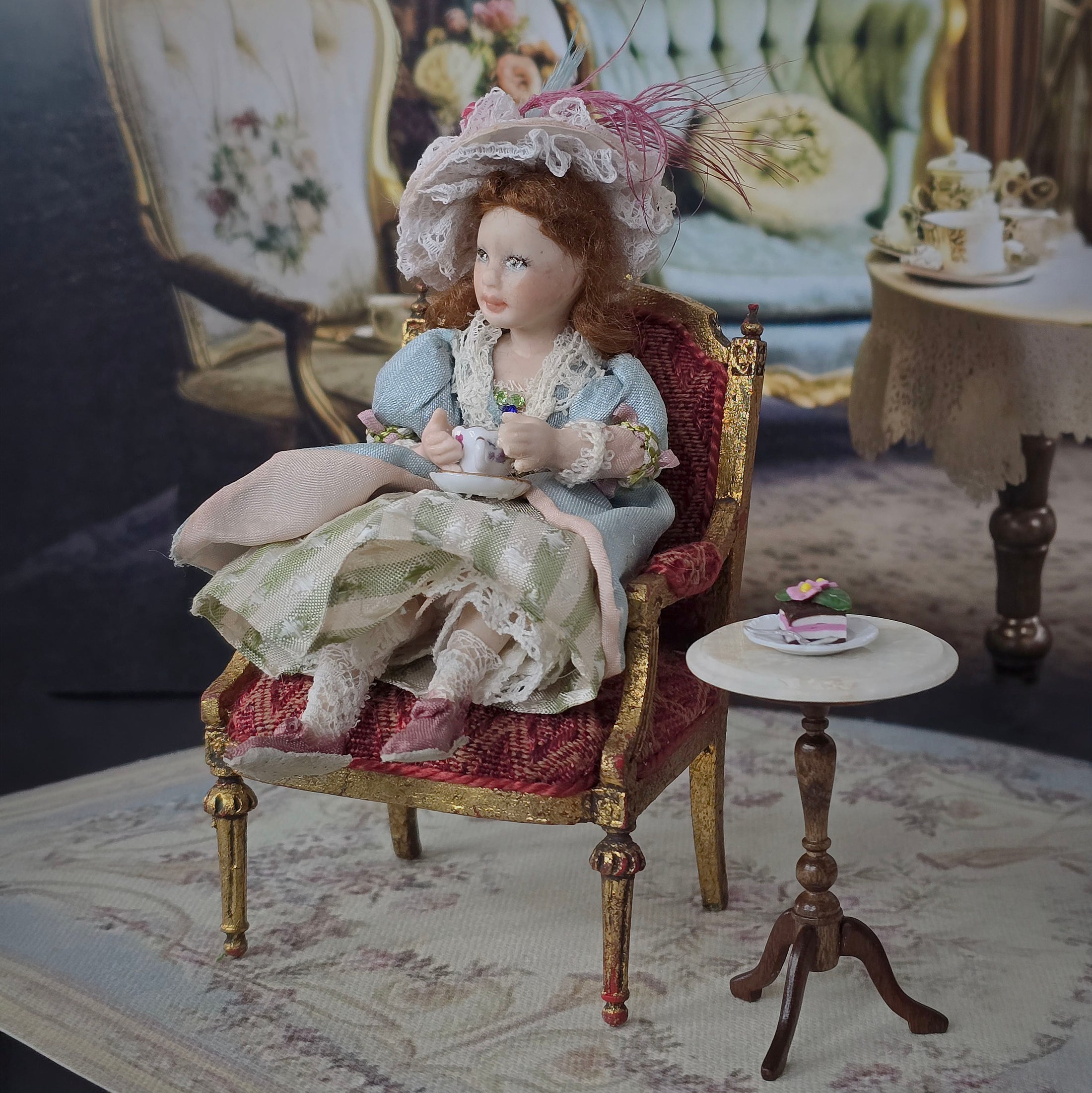 Seated Porcelain Little Girl Doll with Teacup, Pink Feathered Hat & Leather Shoes