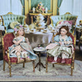 Load image into Gallery viewer, Seated Porcelain Little Girl Doll with Teacup, Pink Feathered Hat & Leather Shoes

