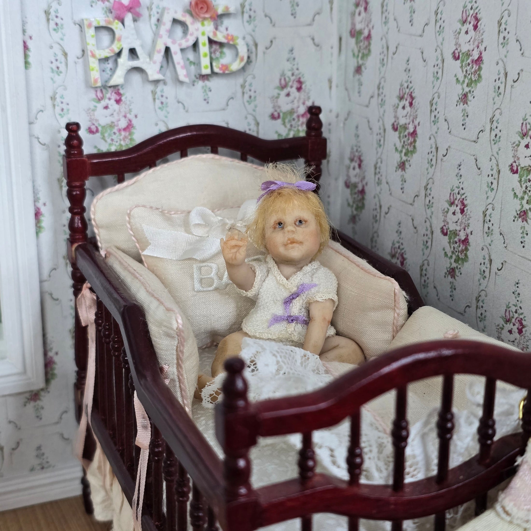 Seated Infant Baby Girl With Purple Ribbons OOAK Artisan Clay Miniature Doll