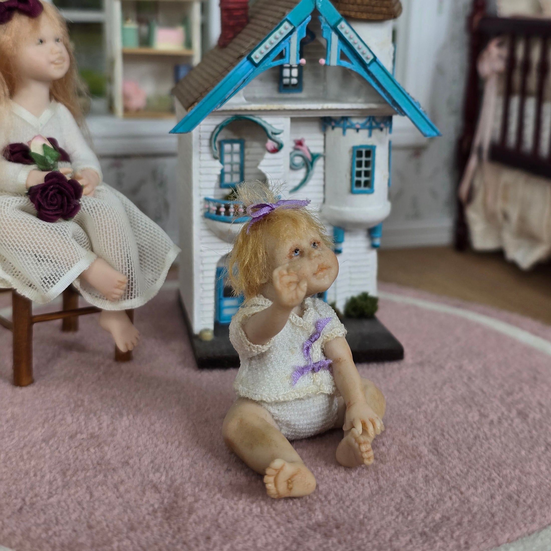 Seated Infant Baby Girl With Purple Ribbons OOAK Artisan Clay Miniature Doll
