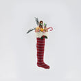 Load image into Gallery viewer, Decorative Christmas stocking with festive items on a light gray background
