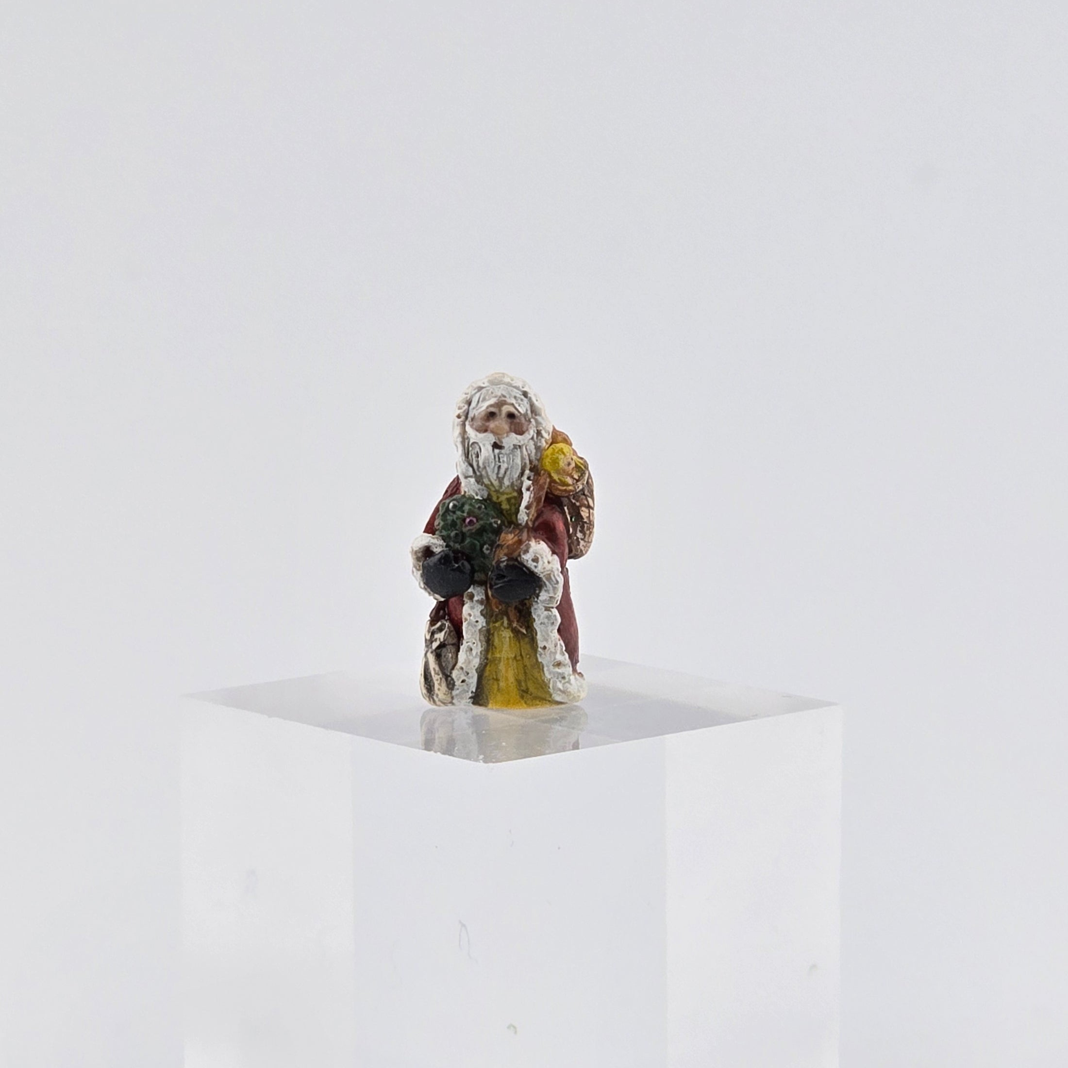 Old World Miniature Santa Figurine by Ann Anderson on white background