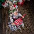 Load image into Gallery viewer, Decorative elf doll with a red bag on a wooden surface
