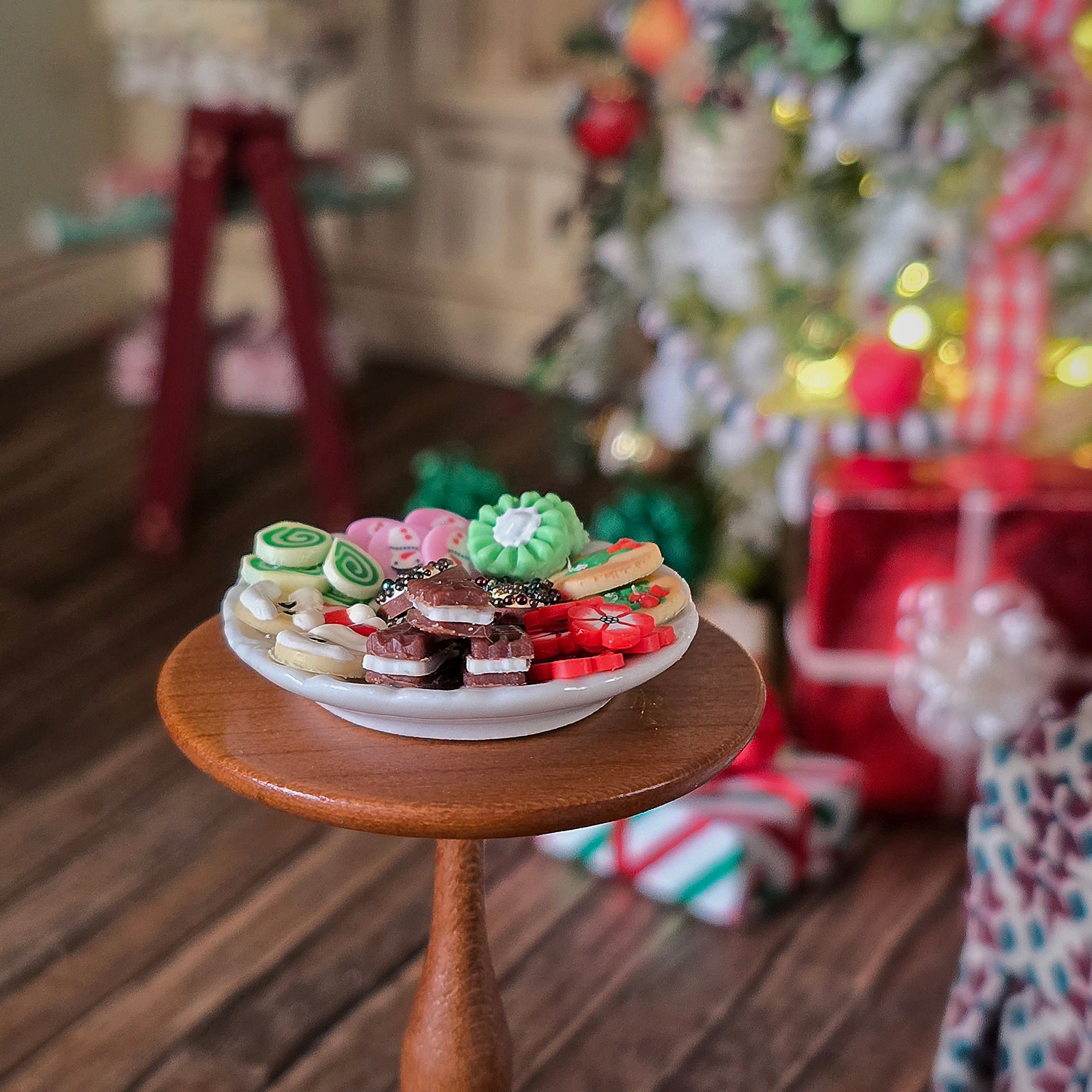 Miniature dollhouse cookie platter, on side table