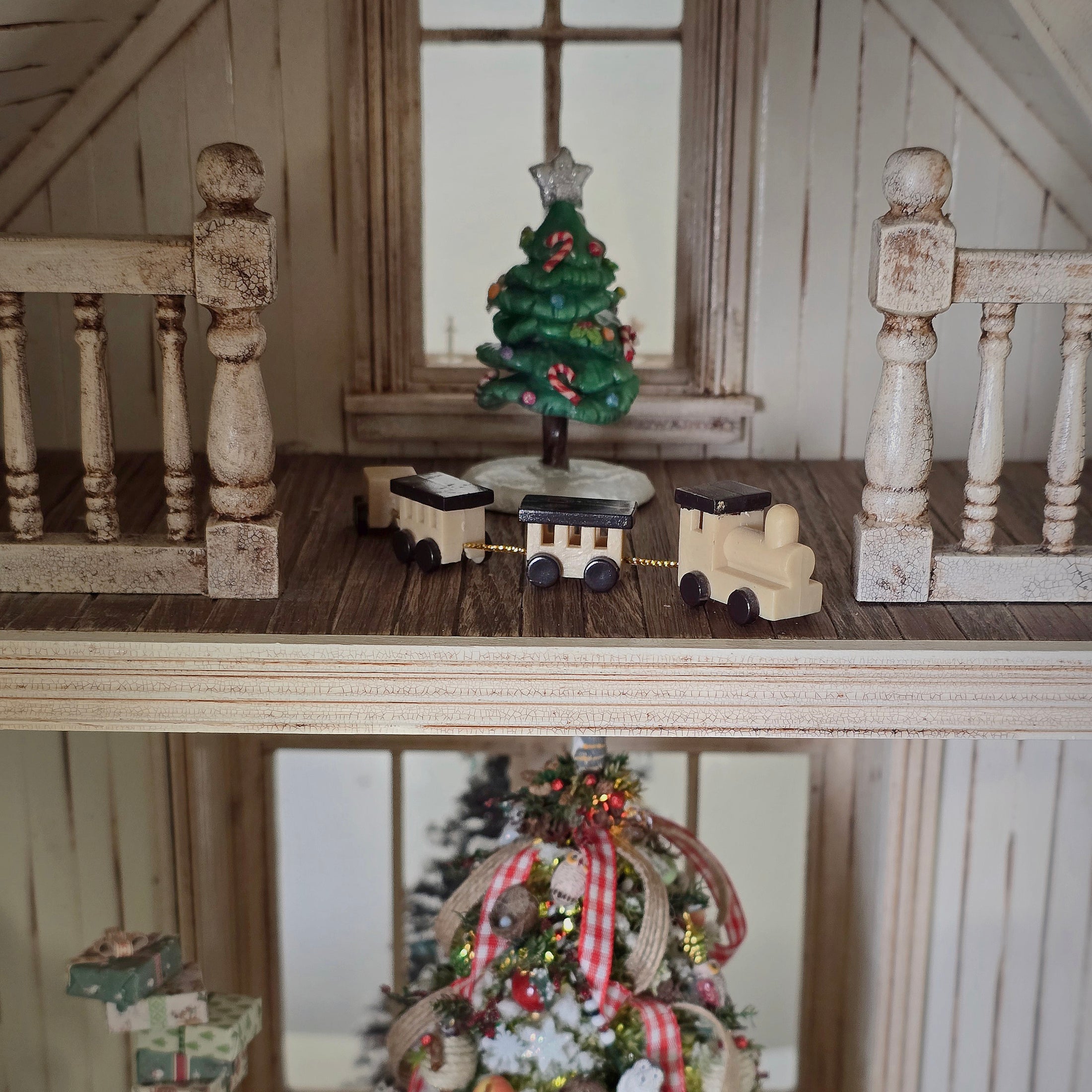resin miniature toy train in cozy room