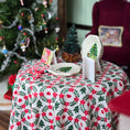 Load image into Gallery viewer, Miniature Christmas table setting with decorative items and a tree in the background.
