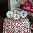 Load image into Gallery viewer, Decorative plates with Christmas designs on a tablecloth with floral pattern
