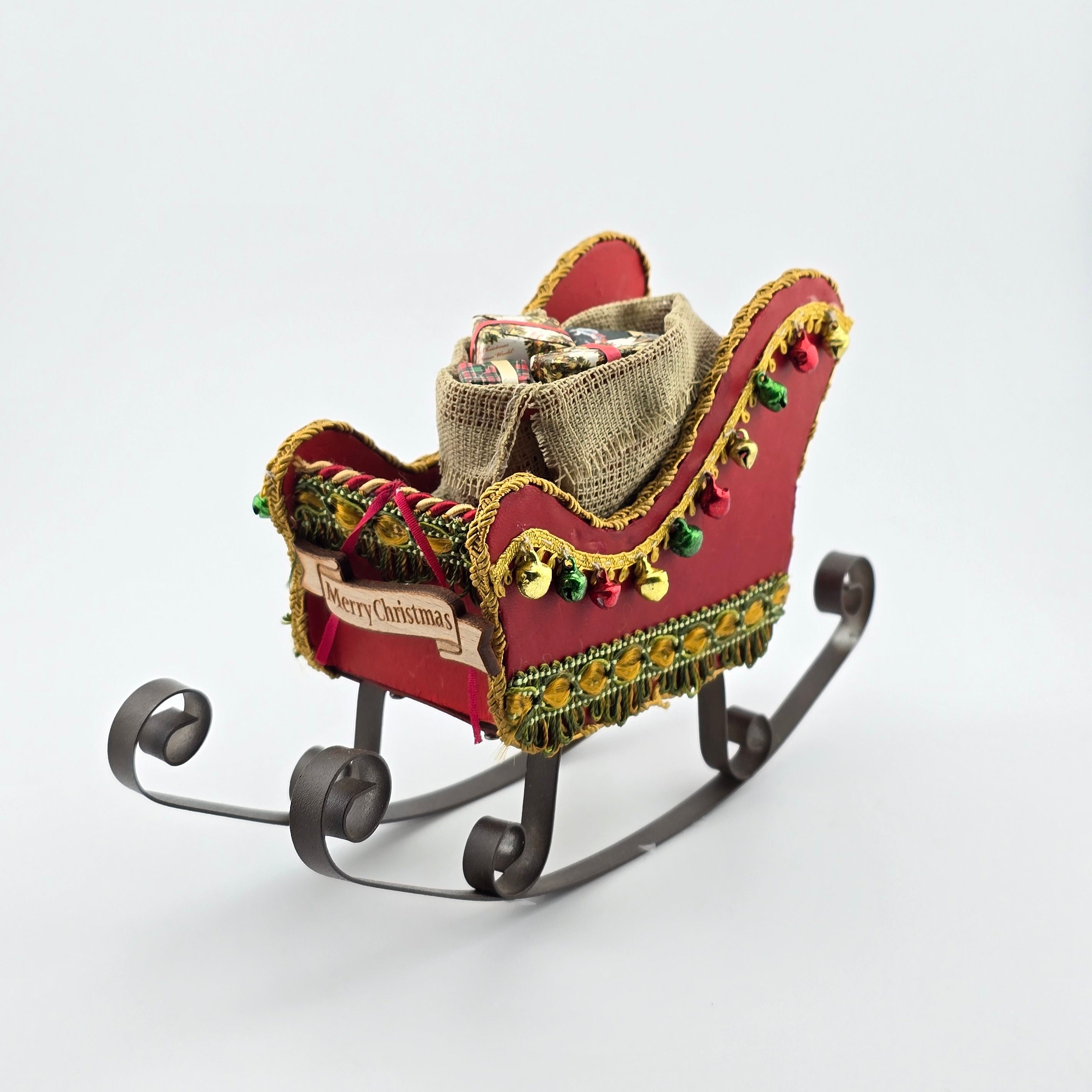Dollhouse Miniature Red Santa Sleigh – Vintage Metal Décor, on white background