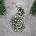 Load image into Gallery viewer, Decorative Christmas tree with colorful ornaments on a textured gray background

