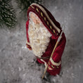 Load image into Gallery viewer, Close-up of a Santa Claus doll with a textured background
