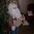 Load image into Gallery viewer, Dollhouse Doll Santa Claus with a long white beard and tool belt, in a festive room with Christmas tree and presents.
