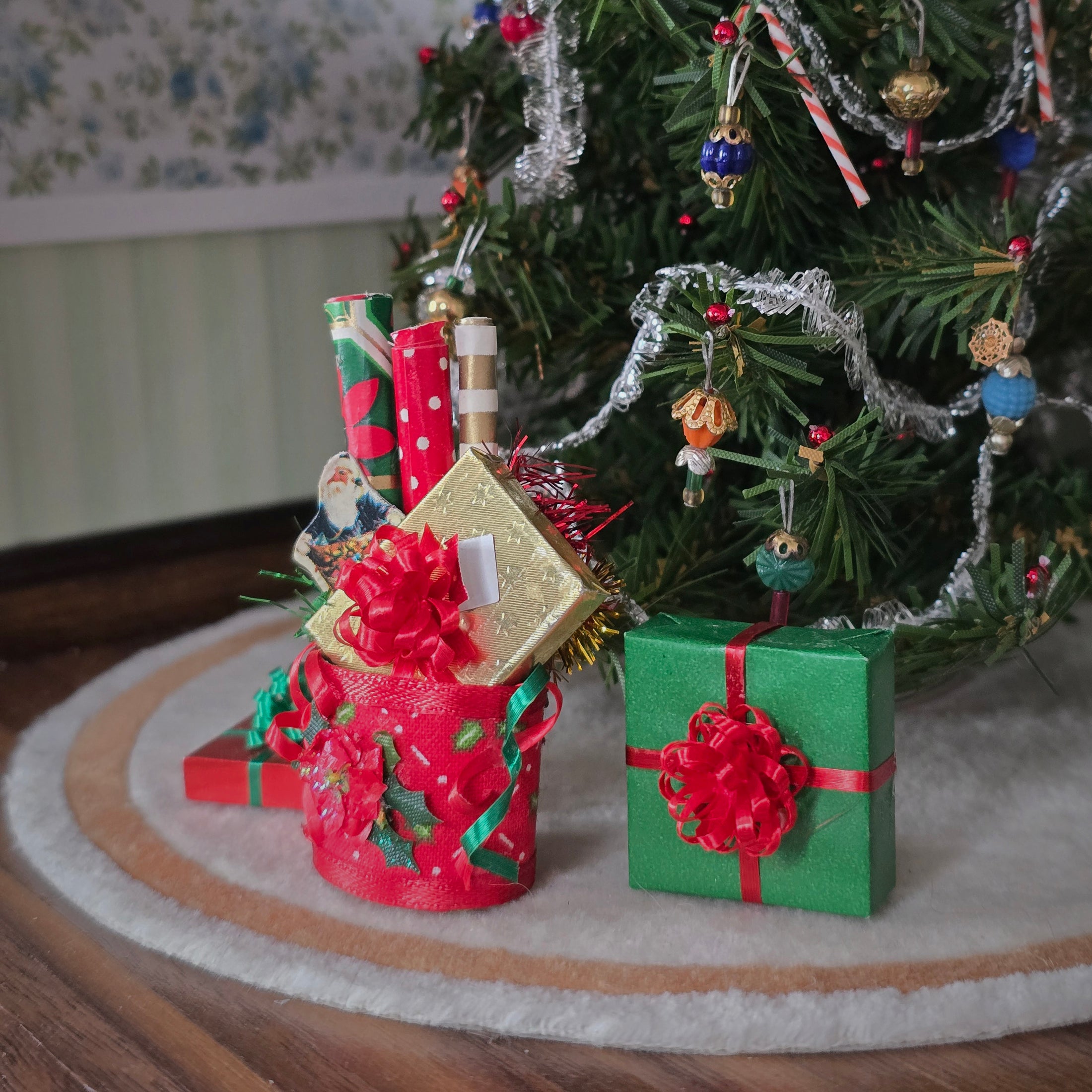 miniature red and green gifts and gift wrapping