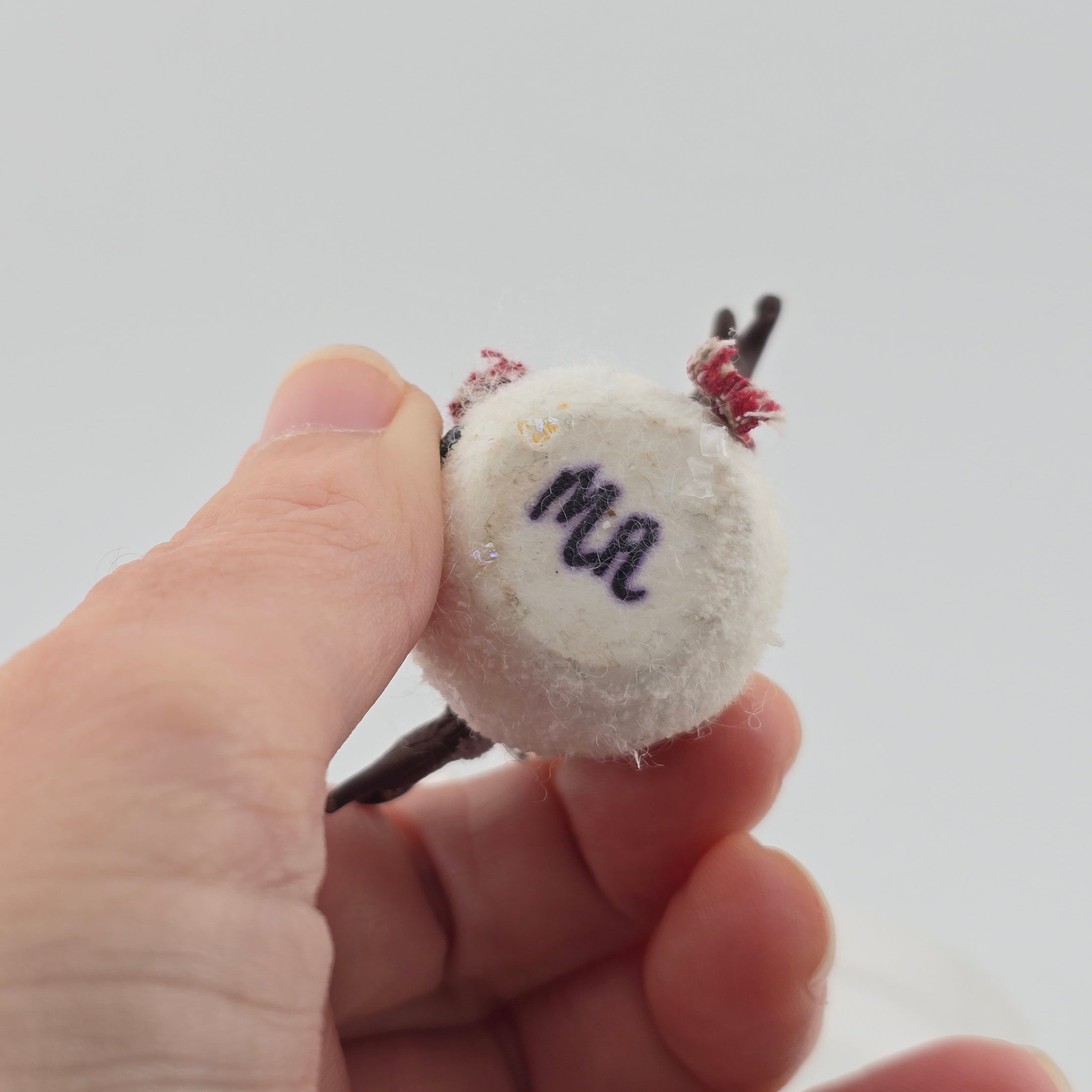 Signed MA on underside of miniature snowman
