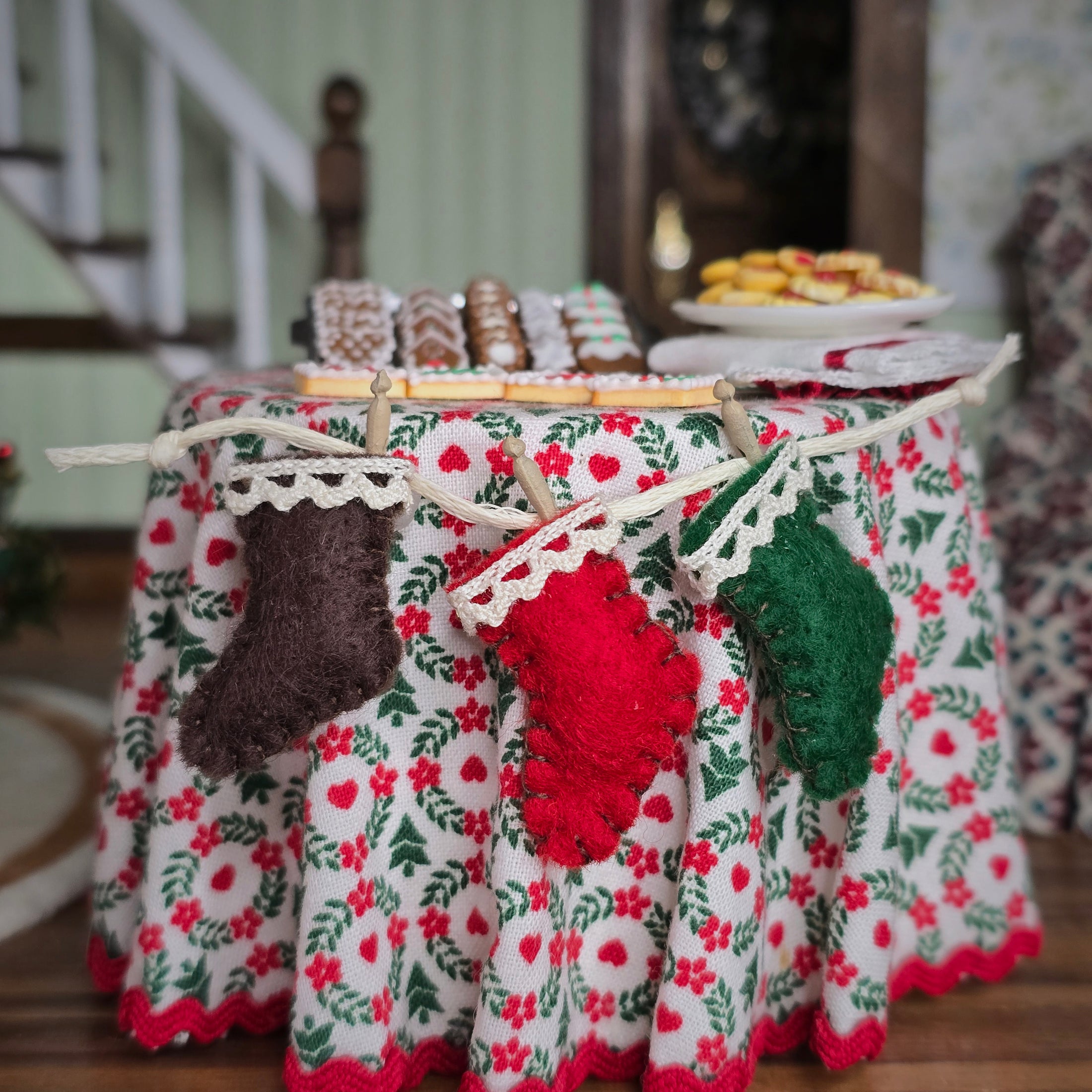 Decorative tablecloth with wool stockings on a table in a home setting