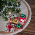 Load image into Gallery viewer, Miniature Christmas presents with decorative ribbons near a small decorated tree on a wooden surface.
