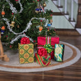 Load image into Gallery viewer, Dollhouse miniature Decorative Christmas scene with a small Christmas tree and presents on a wooden floor. 
