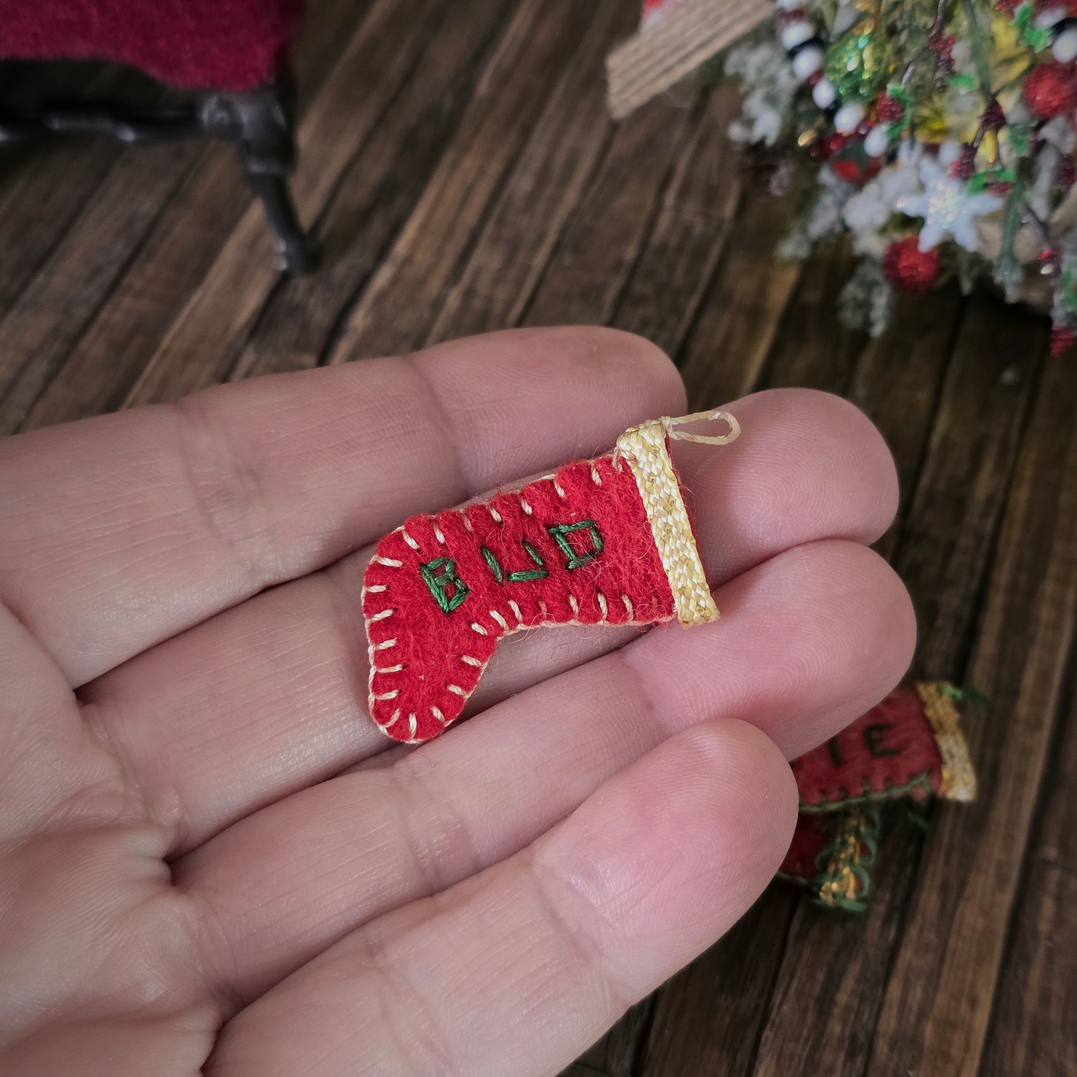close up of vintage dollhouse Bud Christmas stocking