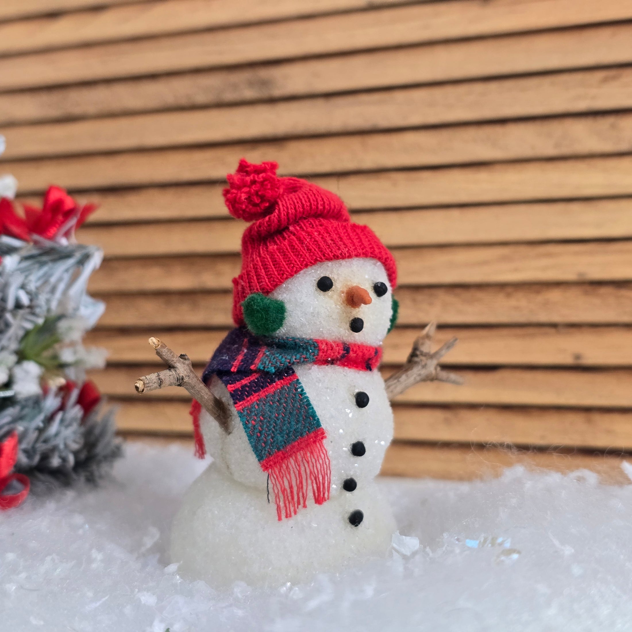 Detail view of tiny, surprised snowman, in 1:12 miniature dollhouse scale. Vintage.
