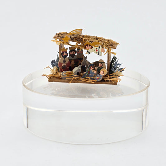 Miniature nativity scene on a white background