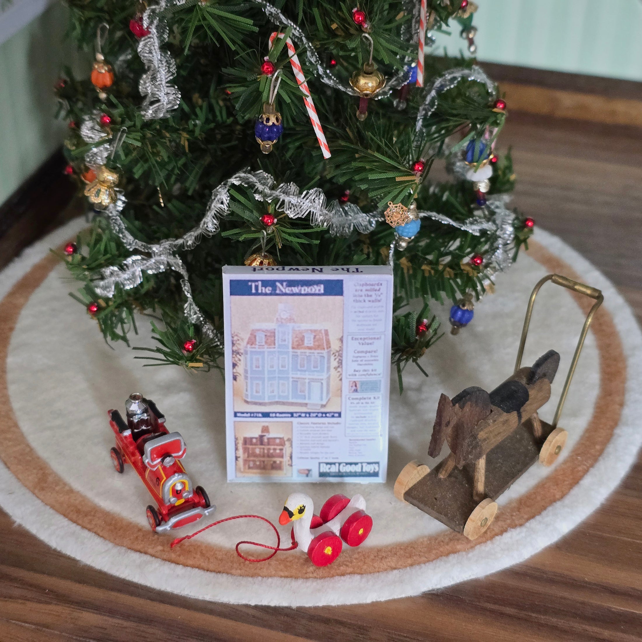 Christmas tree surrounded by toys