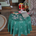 Load image into Gallery viewer, Green tablecloth with snowflake pattern on a small table, surrounded by Miniature dollhouse Christmas baking supplies.
