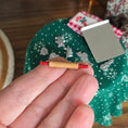 Load image into Gallery viewer, Hand holding a Miniature dollhouse rolling pin made of wood
