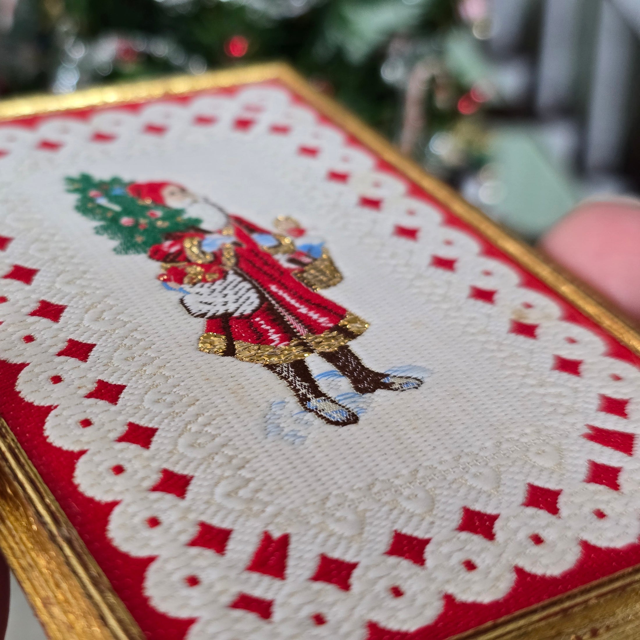 Framed miniature embroidered Victorian Santa Claus, close-up shot