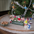 Load image into Gallery viewer, miniature dollhouse snowmen-themed sign, shelf sitter and cookie platter, under tree
