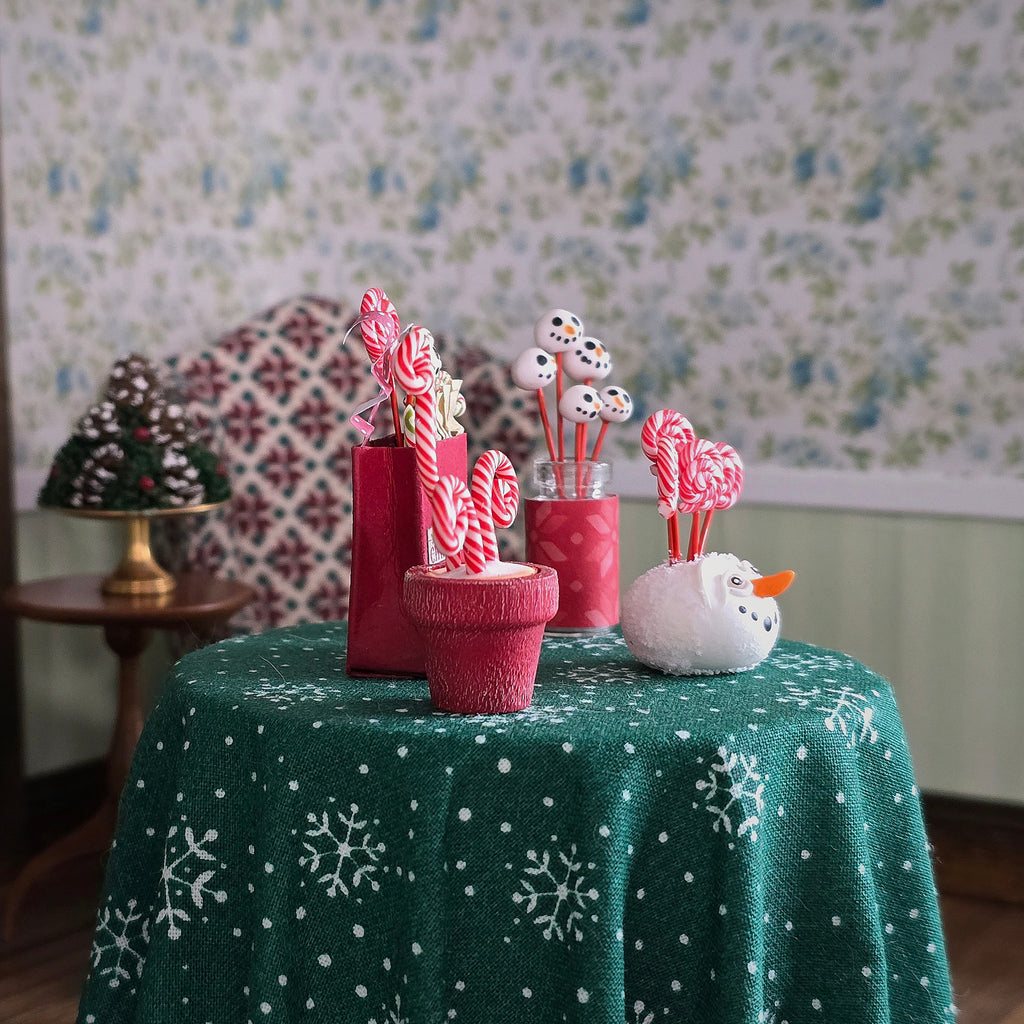 miniature candy displays on a table