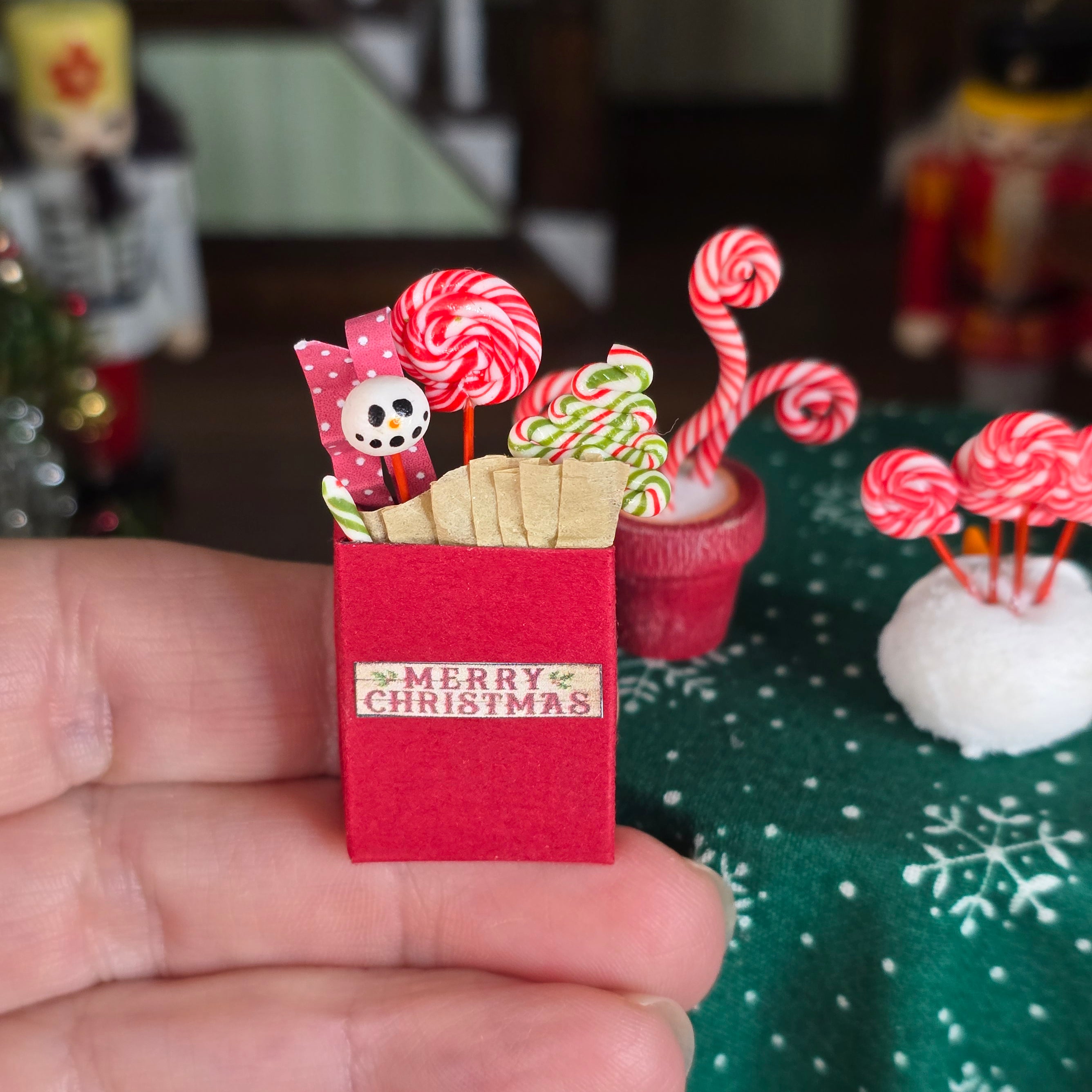 miniature candy display in a hand