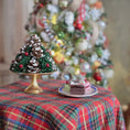 Load image into Gallery viewer, Decorative Christmas tree with pine cones and small cakes on a plate
