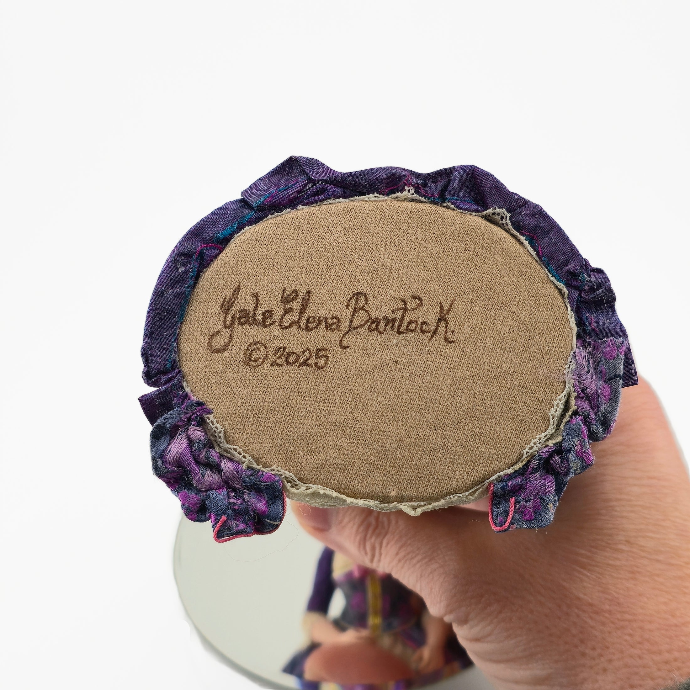 Signed underside of Gale Elena Bantock doll, 2025