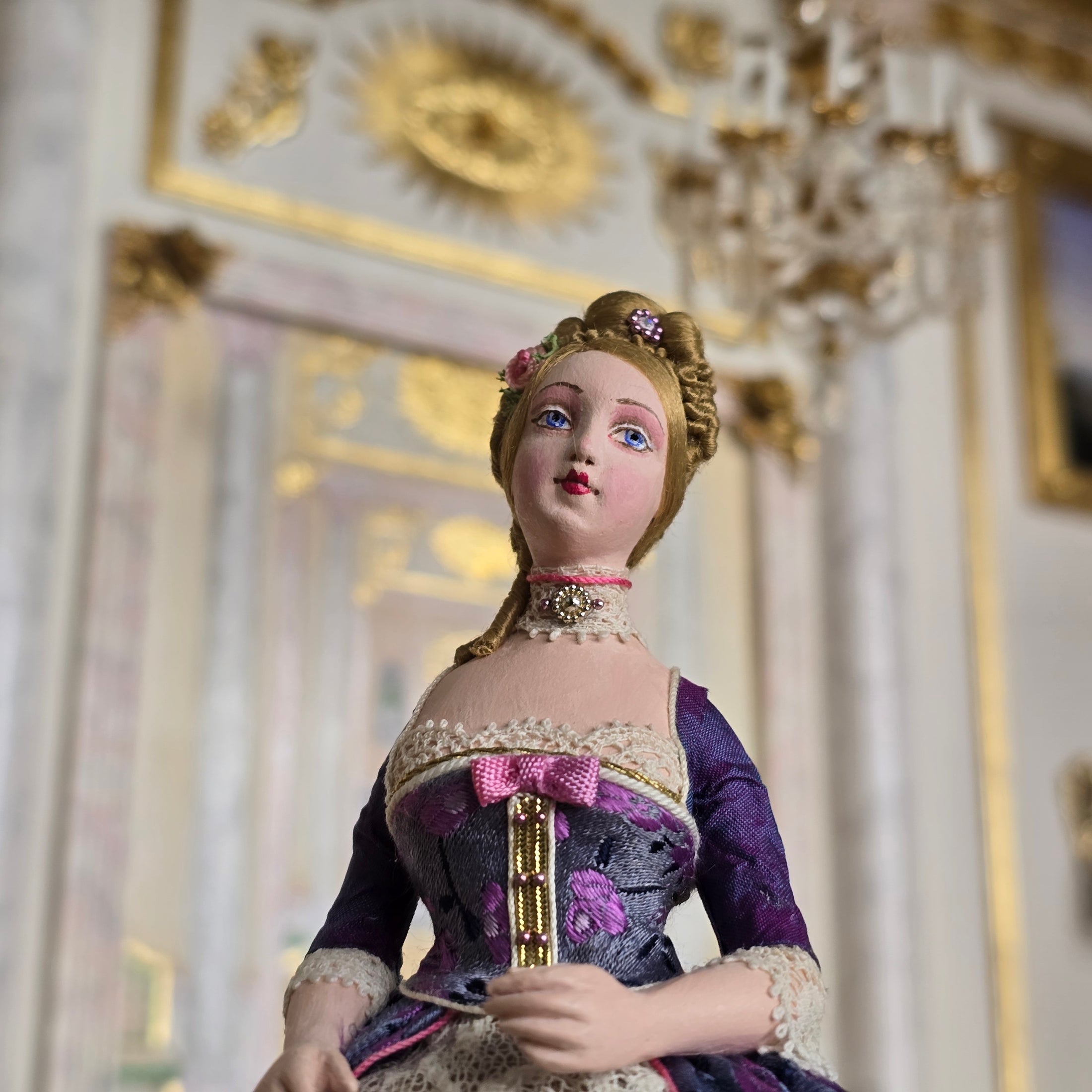 Gale Elena Bantock doll in a decorative setting with intricate details